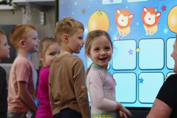 Children playing with BenQ board